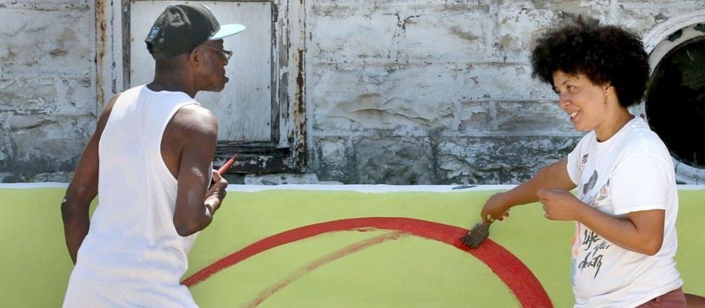 You are currently viewing Mural overlooking the future Black Power Blueprint community basketball court nears completion